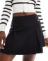 Tommy Jeans pleated mini skirt in black