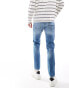 ASOS DESIGN slim jeans in mid wash blue