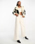 Aria Cove faux shearling contrast leather look cropped coat in black and cream