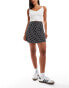 Miss Selfridge button through flippy mini skirt in black polka dot