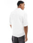 Armani Exchange logo button through short sleeve boxy fit jersey shirt in white