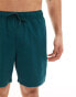 ASOS DESIGN swim shorts in mid length in forest green