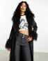 Reclaimed Vintage longline leather look mac with faux fur collar in black