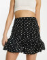 In The Style x Georgia Louise ruffle detail mini skirt in mono spot print