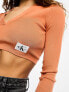 Calvin Klein Jeans label tight crop v-neck sweater in burnt clay