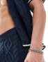 ASOS DESIGN co-ord knitted spliced cable and pointelle stitch shorts with tipping in navy