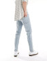 ASOS DESIGN tapered jeans in light wash blue