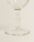 Raised design wine glass