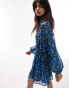 Topshop chuck on channeled button down mini dress in blue floral