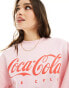 ASOS DESIGN oversized sweat with coca cola licence graphic in pink