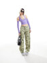 ASOS DESIGN oversized cargo trouser in blurred camo print