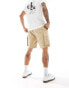 Calvin Klein Jeans badge cargo shorts in beige