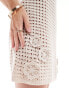 ASOS DESIGN holiday knitted halter mini dress with 3D flowers in cream