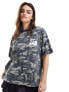 ASOS DESIGN oversized t-shirt with graphic in washed camo print