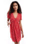 Monki mini dress with puff sleeves and tie front in red ditsy print