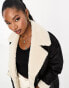 4th & Reckless longline contrast faux shearling coat in black and cream