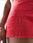 SNDYS embossed knitted shorts in red