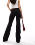 Weekday Kate low waist slightly flared trousers in black