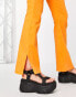 ASOS DESIGN hipster bengaline flare trousers in pop orange