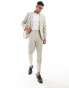 ASOS DESIGN tapered suit trousers in textured fabric in stone