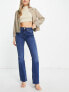 River Island mid rise flare jean in dark blue