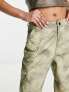 ASOS DESIGN oversized cargo trouser in blurred camo print