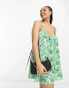 ASOS DESIGN Curve tie strap detail trapeze mini slip dress in green tile print