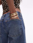 Topshop Ember low rise wide leg jeans in mid blue