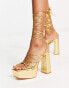 Truffle Collection mega platform strappy sandals in gold metallic