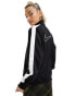 Nike Streetwear woven zip through track jacket in black