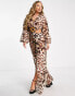 ASOS DESIGN cut out plunge jumpsuit with raffia buckle in leopard print