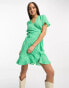 Vero Moda wrap mini dress in bright green spot print