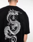 ASOS DESIGN oversized t-shirt in black with back souvenir dragon print