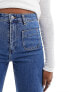 & Other Stories high waist flared jeans in mid blue